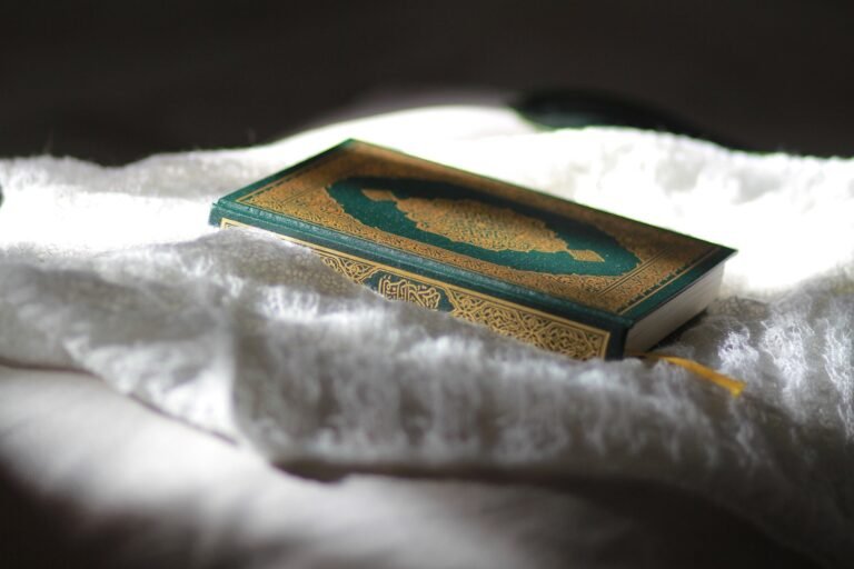 Copy of the Holy Quran resting on a white cloth